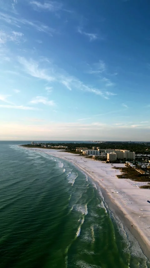 Vertical Drone View of White Sand Beach and Ocean Waves Along Coastline Stock Footage 330699945