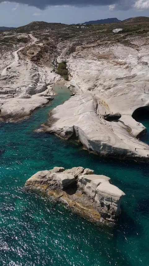 Vertical Drone View of White Volcanic Rocks at Sarakiniko Beach Milos, 4K Stock Footage 337175265