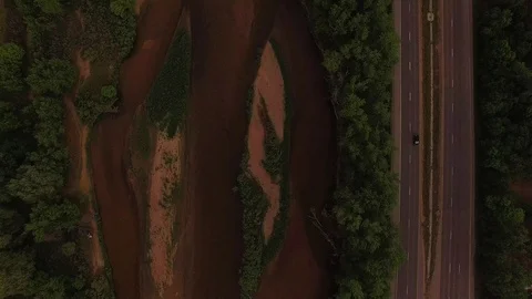 Vertical Drop Down to River Color Corrected Stock Footage 98847312