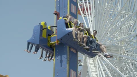 Vertical Dropping Amusement Park Ride - Slow Motion 240FPS Stock Footage 63406360