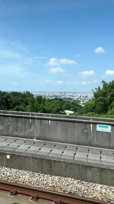 (Vertical) Dry Grass Hillside Passing by a Taiwanese High-Speed Rail Window Stock Footage 341750907