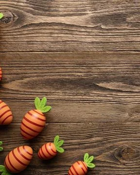 Vertical Easter background with eggs carrots Foto stock