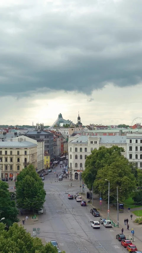 Vertical elevated view of Riga city street traffic with classic architecture Stock Footage 341851487