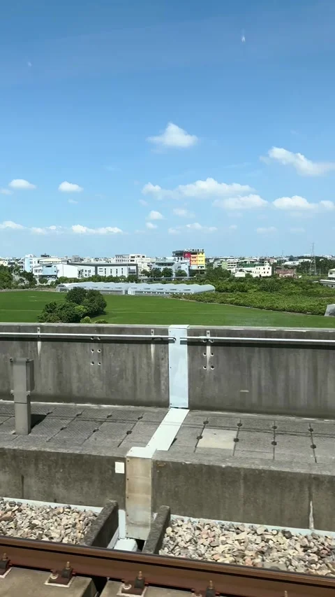 (Vertical) Elevated View of Taiwanese City and Farmland from a Train Window Stock Footage 341751144