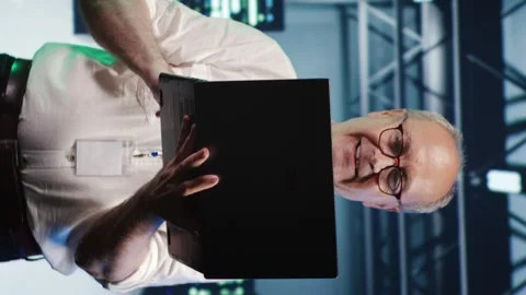 Vertical Employee optimizes data center Stock Footage 247796409