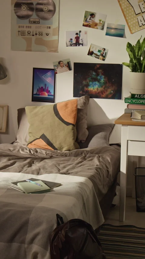 Vertical of Empty Teenage Bedroom Featuring Bed and Desk Stock Footage 338094600