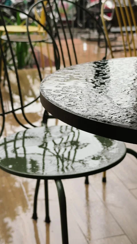 Vertical Empty Wet Cafe Table Closeup during Rainy Day Stock Footage 343042053