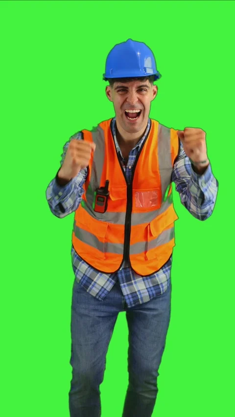 Vertical Enthusiastic construction worker celebrating with clenched fists w.. Stock-Footage 287327955