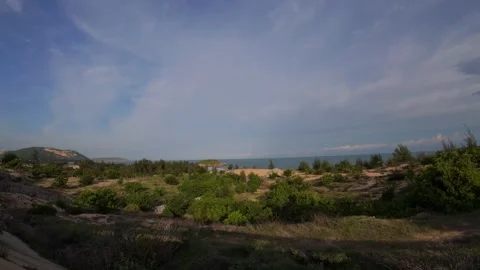 Vertical Establishing Shot of Beautiful Mui Ne Beach and Hills Stock Footage 339990238