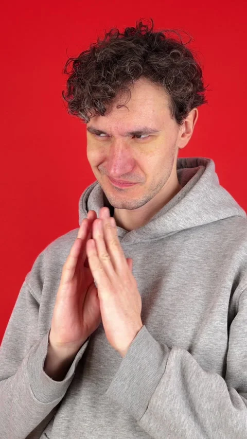 Vertical Evil genius action. Guy have idea. Planning evil. 動画素材 304761970