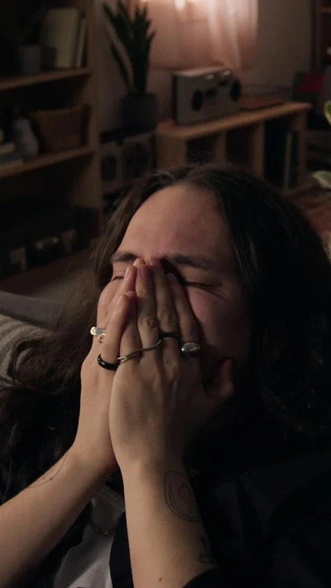 Vertical of Exhausted Man Covering Face with Hands in Deep Despair Vídeo Stock 338055051