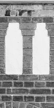 Vertical Faade Detail with Two Plaster Inlays and Brick Bands 스톡 사진