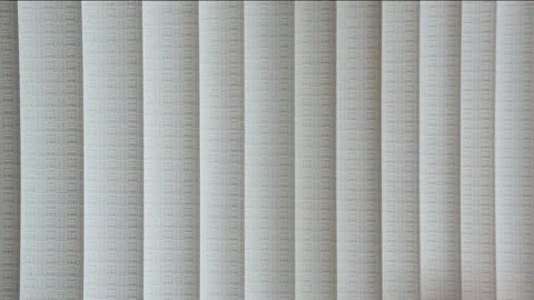 Vertical fabric blinds closed inside house. Stock Footage 255273659