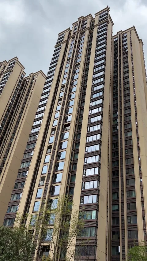 Vertical Facade of dense residential skyscrapers in Chengdu city 動画素材 334900745