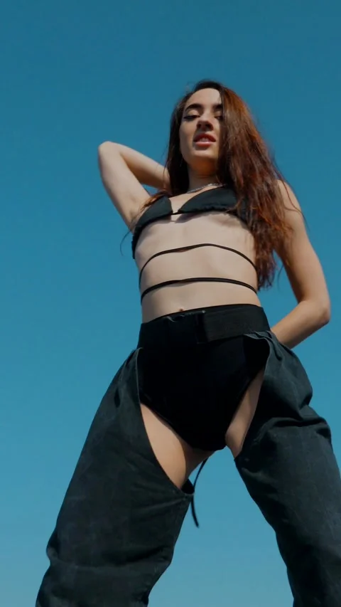 Vertical Fashion Model Dancing Sensually On Rooftop In Summer Sunshine. Stock Footage 342223463