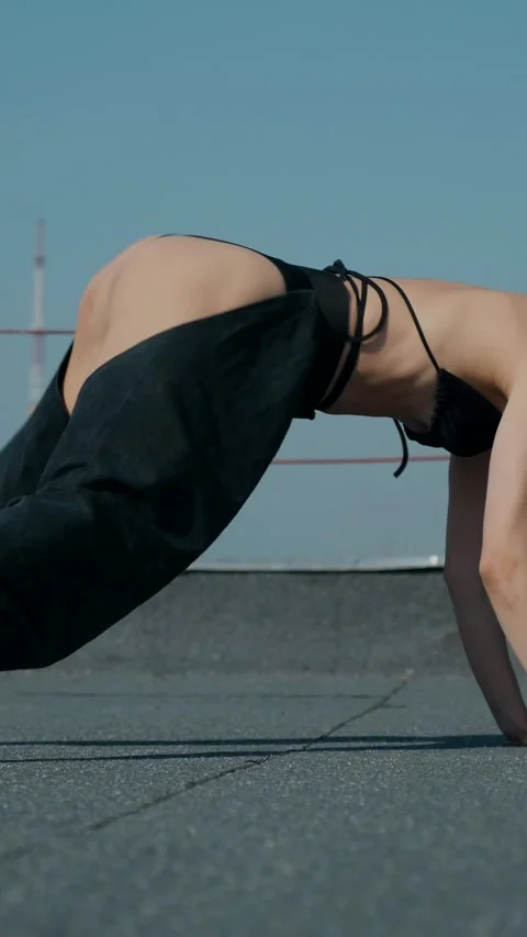 Vertical Fashion Model Dancing Sensually On Rooftop In Summer Sunshine. Stock Footage 342223478