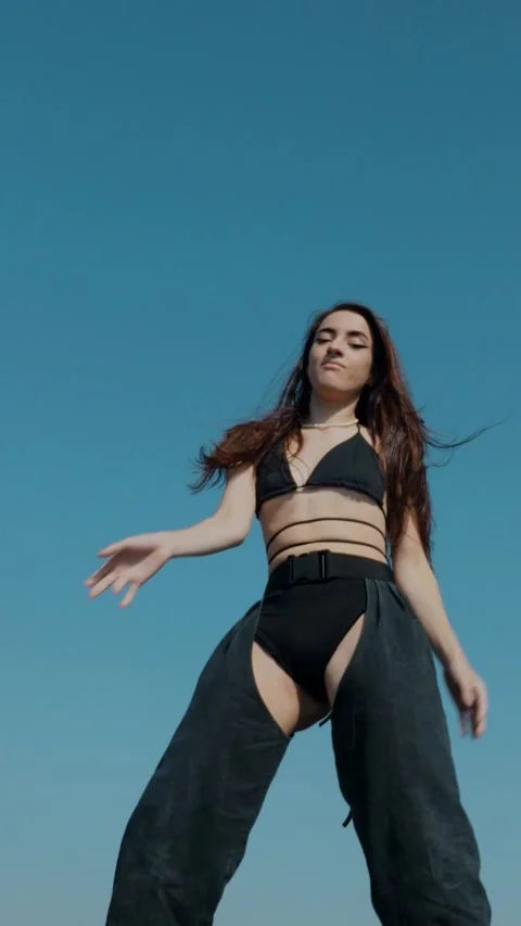 Vertical Fashion Model Dancing Sensually On Rooftop In Summer Sunshine. Stock Footage 342223504