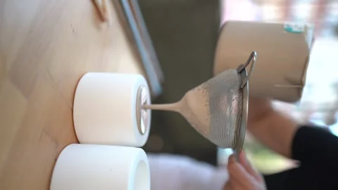 Vertical - Female craftsman makes ceramic cups. Manual labor - Women's rights Stock Footage 252592968