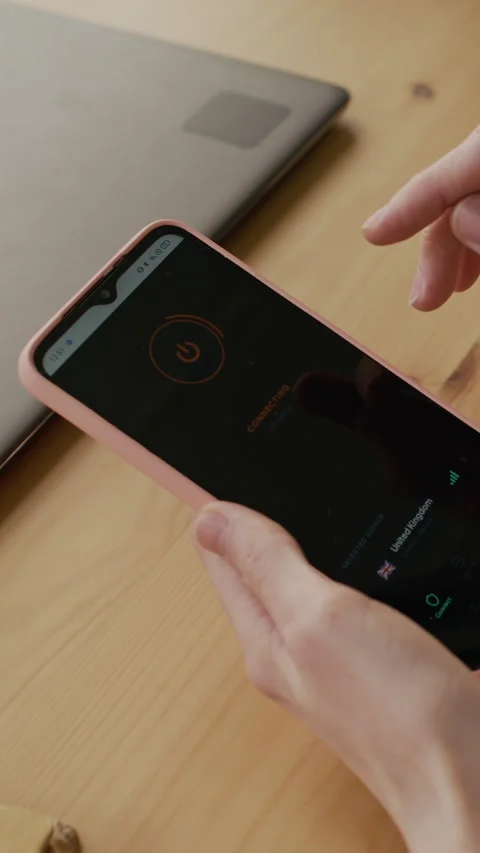 Vertical of Female Hands Setting Up VPN Connection on Smartphone Stock Footage 332446168