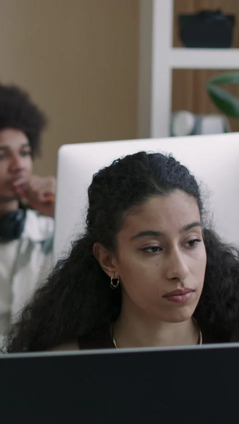 Vertical of Female Programmer Working on Computer in Office Stock Footage 275029540