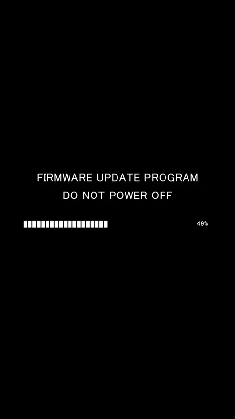 Vertical firmware update program progress bar with do not power off warning Stock Footage 337937477