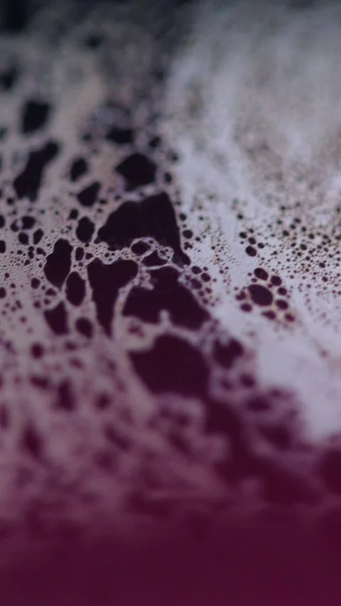 Vertical fizzy fluid texture acid liquid oil slick Stock Footage 311992728