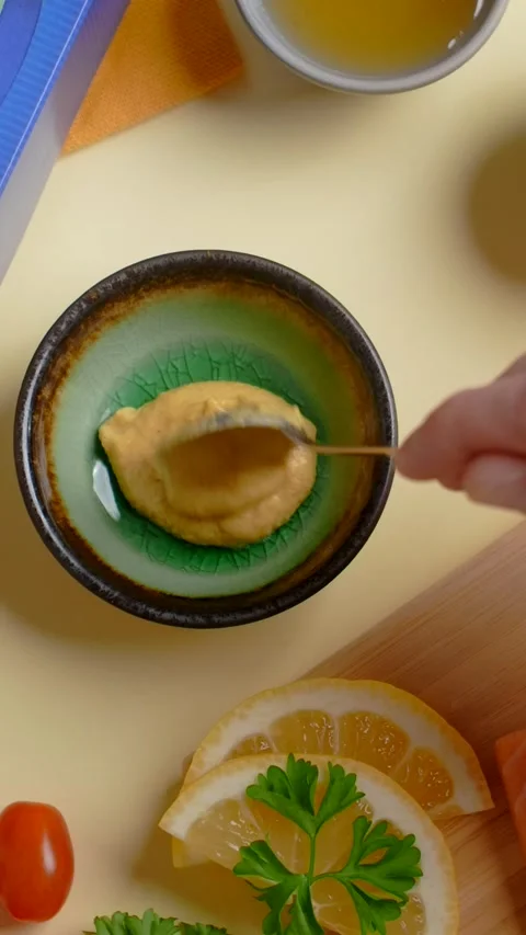 Vertical flat lay: chef mixes sauce with mustard and honey Stock Footage 178842501