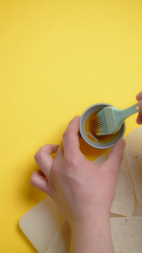 Vertical flat lay: chef mixes spicy sauce for nachos Stock Footage 178862758