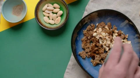 Vertical flat lay food video: chef mixes bread crumbs with spices Video stock 181852749