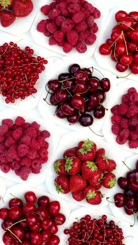 Vertical Flat Lay Of Fresh Red Berries And Cherries Overhead Stock Footage 343280726