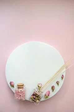 Vertical Flat Lay SPA witn copy space and pink sea salt in a glass jar Stock Photos