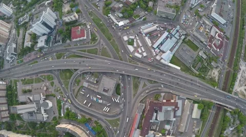 Vertical flight above the road junction with transport Stock Footage 64373248