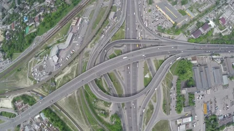 Vertical flight above the round road junction. Stock Footage 64374708