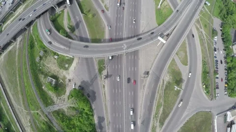 Vertical flight across the round road junction Stock Footage 64375127