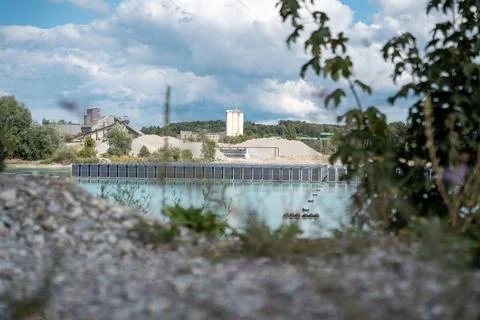 Vertical floating solar panels on the Gilching quarry lake in Bavaria, Germany Stock Photos