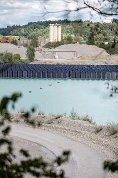Vertical floating solar panels on the Gilching quarry lake in Bavaria, Germany Stock Photos
