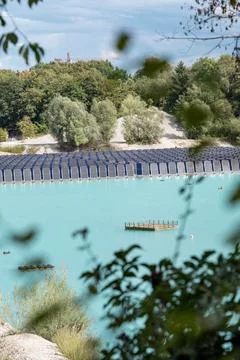 Vertical floating solar panels on the Gilching quarry lake in Bavaria, Germany Stock Photos