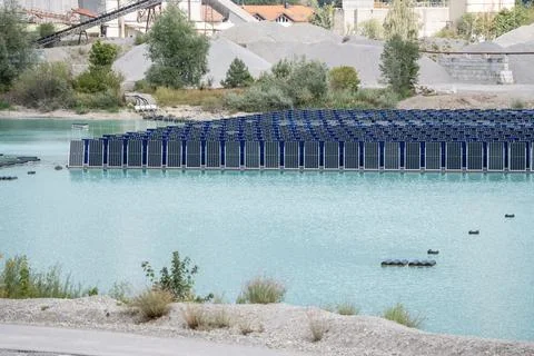 Vertical floating solar panels on the Gilching quarry lake in Bavaria, Germany Stock Photos