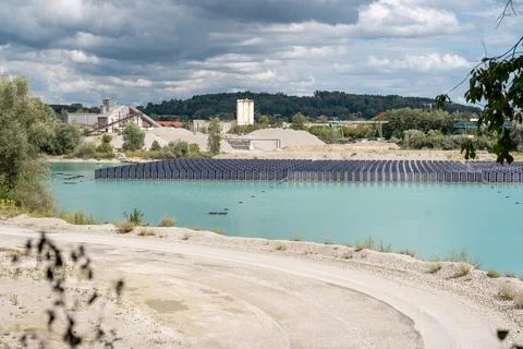 Vertical floating solar panels on the Gilching quarry lake in Bavaria, Germany Stock Photos