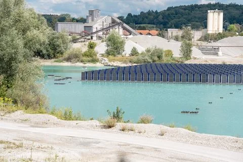 Vertical floating solar panels on the Gilching quarry lake in Bavaria, Germany Stock Photos