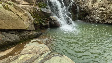Vertical Flow Waterfall Tilt 4K - Following the Cascade for Zen &amp; Pure Purity Video stock 332146533