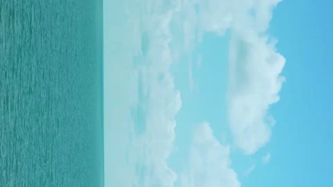 Vertical, Fluffy White Clouds in Blue Sunny Sky Sea, Time Lapse. Blue Cloudy Sky Stock-Footage 312256387