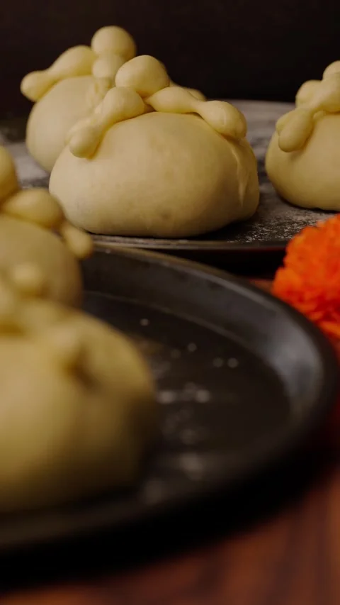 Vertical food video, Bread of the dead or hojaldras before baking Stock Footage 282499393