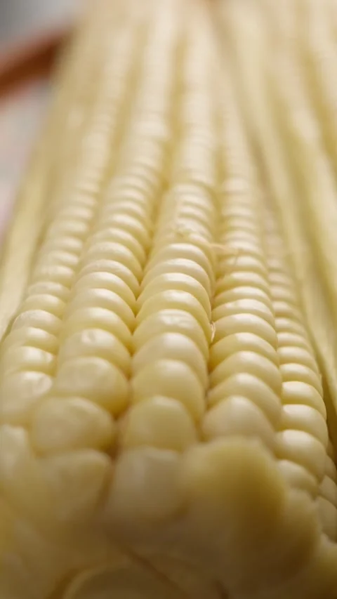 Vertical food video macro view of a mexican cooked elote dolly in Stock Footage 280327840