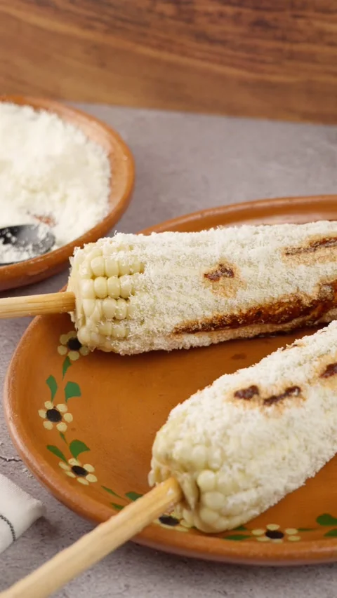 Vertical food video Top view of a dish known in Mexico as elote prepared Stock Footage 280327844