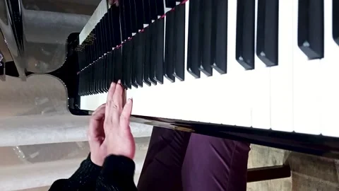 Vertical footage close up of hands playing a piano. Shot. Man play on old royal Stock-Footage 141645554
