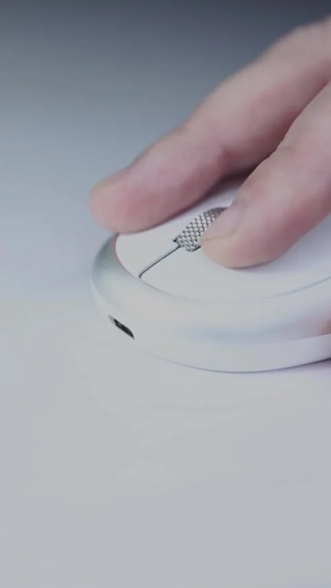 Vertical footage of computer mouse white background Stock Footage 300767540