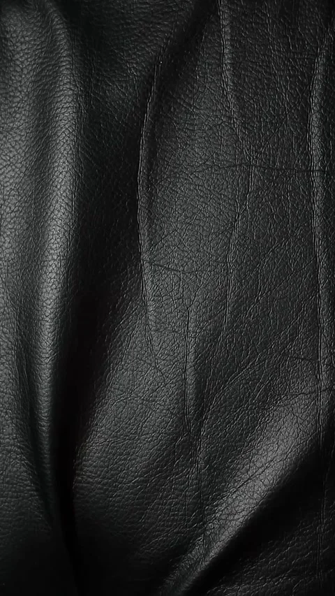 Vertical footage of dark leather background Stock Footage 292772968