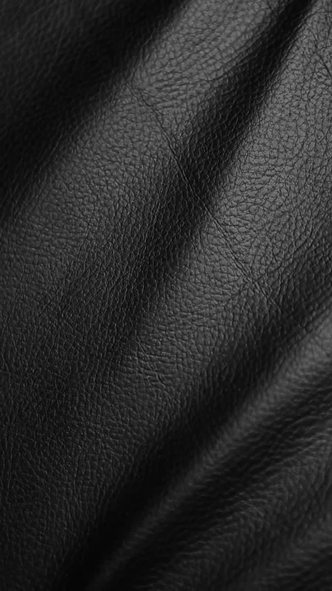 Vertical footage of dark leather background Stock Footage 300560373