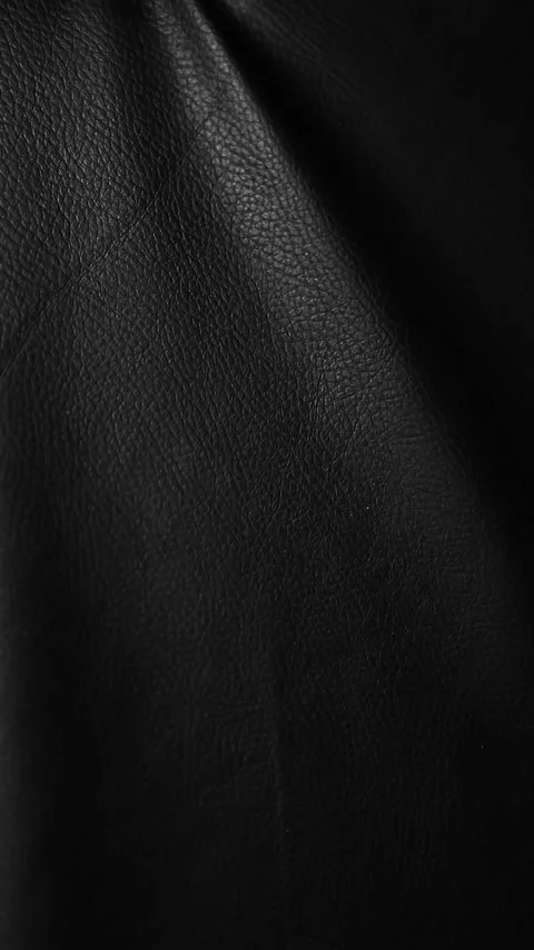 Vertical footage of dark leather background Stock Footage 300560438